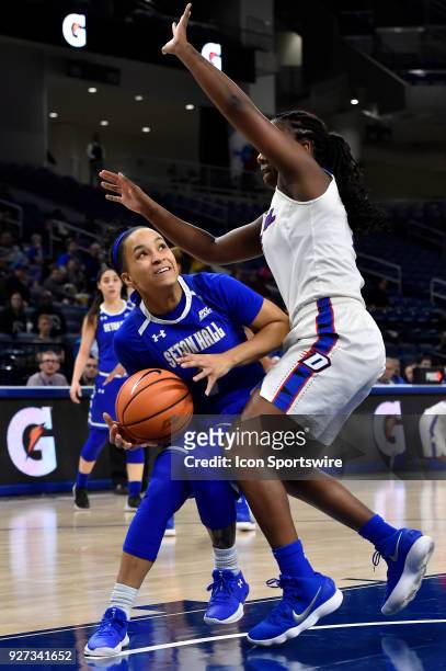Seton Hall Pirates guard Kaela Hilaire drives against DePaul Blue Demons guard Ashton Millender on March 4, 2018 at the Wintrust Arena in Chicago,...