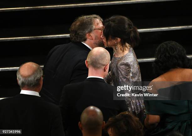 Director Guillermo del Toro and actor Sally Hawkins celebrate winning Best Picture for 'The Shape of Water' during the 90th Annual Academy Awards at...