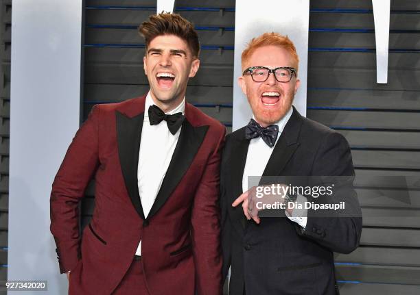 Justin Mikita and Jesse Tyler Ferguson attend the 2018 Vanity Fair Oscar Party hosted by Radhika Jones at Wallis Annenberg Center for the Performing...