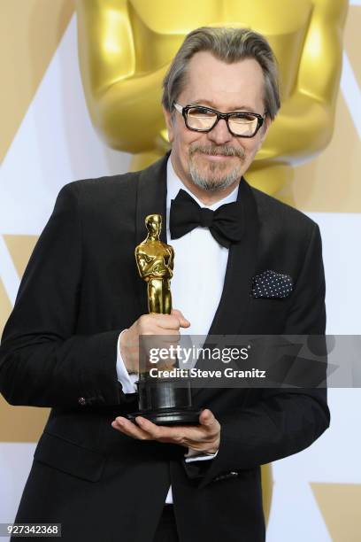 Actor Gary Oldman winner of Best Actor for "Darkest Hour" poses in the press room during the 90th Annual Academy Awards at Hollywood & Highland...