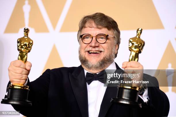 Filmmaker Guillermo del Toro, winner of the Best Director and Best Picture awards for 'The Shape of Water,' poses in the press room during the 90th...