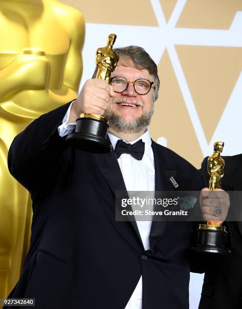 Guillermo del Toro winner of Best Director and Best Picture for "Shape of Water" poses in the press room during the 90th Annual Academy Awards at...