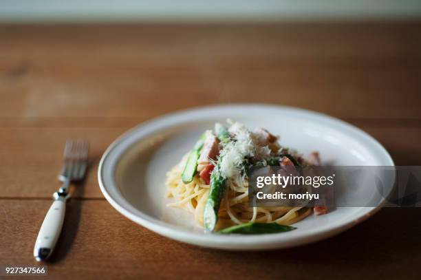 cream spaghetti with asparagus and pancetta - pancetta stock pictures, royalty-free photos & images