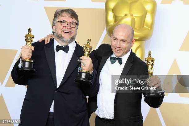 Filmmaker Guillermo del Toro , winner of the Best Director and Best Picture awards for 'The Shape of Water,' and producer J. Miles Dale, winner of...