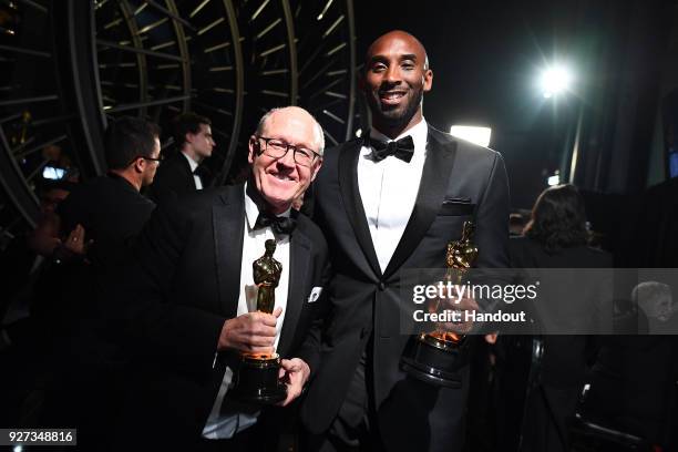 In this handout provided by A.M.P.A.S., Glen Keane and Kobe Bryant attend the 90th Annual Academy Awards at the Dolby Theatre on March 4, 2018 in...