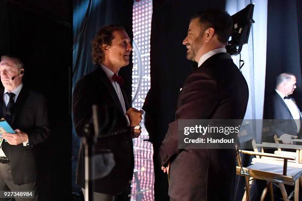 In this handout provided by A.M.P.A.S., Matthew McConaughey and Jimmy Kimmel attend the 90th Annual Academy Awards at the Dolby Theatre on March 4,...