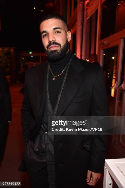 Drake attends the 2018 Vanity Fair Oscar Party hosted by Radhika Jones at Wallis Annenberg Center for the Performing Arts on March 4, 2018 in Beverly...
