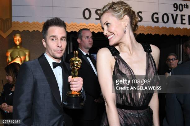 Actor Sam Rockwell and his wife Leslie Bibb attend the 90th Annual Academy Awards Governors Ball at the Hollywood & Highland Center on March 4 in...