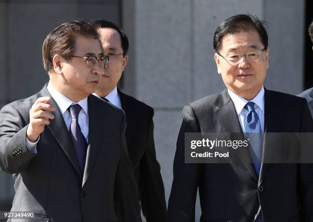 Chung Eui-Yong , head of the presidential National Security Office, and Suh Hoon , the chief of the South's National Intelligence Service, talk...