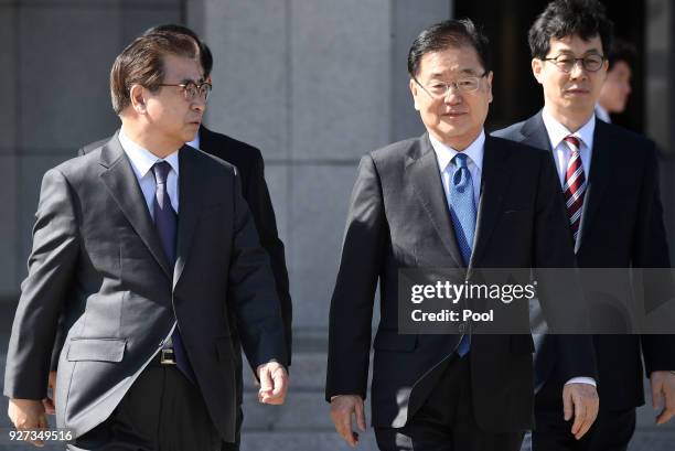 Chung Eui-Yong , head of the presidential National Security Office, and Suh Hoon , the chief of the South's National Intelligence Service, talk...