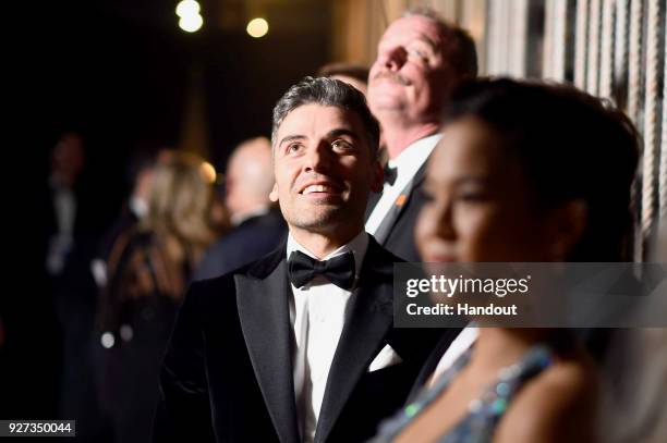 In this handout provided by A.M.P.A.S., Oscar Issac attend the 90th Annual Academy Awards at the Dolby Theatre on March 4, 2018 in Hollywood,...