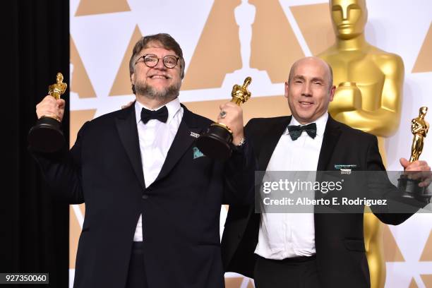 Filmmaker Guillermo del Toro , winner of the Best Director and Best Picture awards for 'The Shape of Water,' and producer J. Miles Dale, winner of...