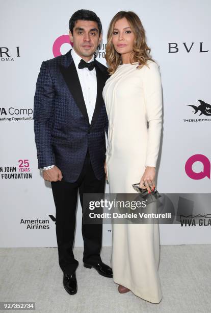 Timur Tillyaev and Lola Karimova-Tillyaeva attend Elton John AIDS Foundation 26th Annual Academy Awards Viewing Party at The City of West Hollywood...