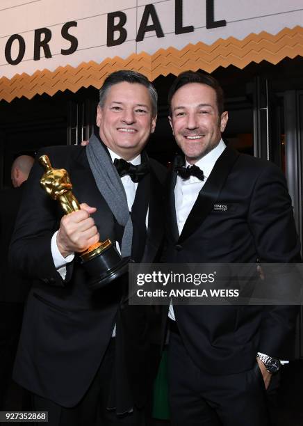 Chief content officer for Netflix Ted Sarandos and Best Documentary Feature laureate US director Bryan Fogel attend the 90th Annual Academy Awards...