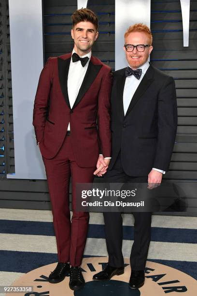 Justin Mikita and Jesse Tyler Ferguson attend the 2018 Vanity Fair Oscar Party hosted by Radhika Jones at Wallis Annenberg Center for the Performing...