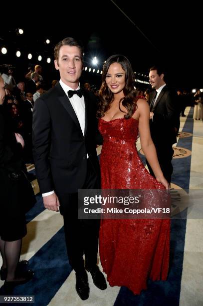 Miles Teller and Keleigh Sperry attend the 2018 Vanity Fair Oscar Party hosted by Radhika Jones at Wallis Annenberg Center for the Performing Arts on...
