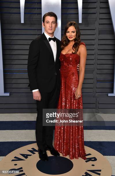 Actor Miles Teller and Keleigh Sperry attend the 2018 Vanity Fair Oscar Party hosted by Radhika Jones at Wallis Annenberg Center for the Performing...