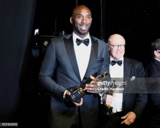 In this handout provided by A.M.P.A.S., Kobe Bryant , winner of the Best Animated Short Film award for 'Dear Basketball,' attends the 90th Annual...