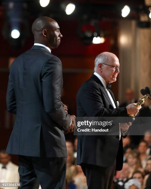 In this handout provided by A.M.P.A.S., Kobe Bryant , winner of the Best Animated Short Film award for 'Dear Basketball,' attends the 90th Annual...