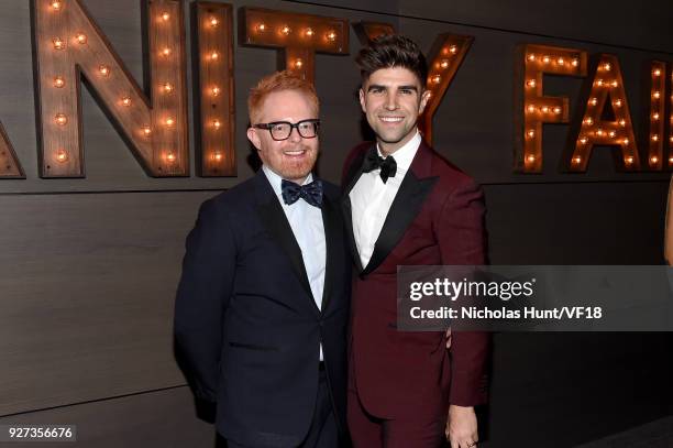 Jesse Tyler Ferguson and Justin Mikita attend the 2018 Vanity Fair Oscar Party hosted by Radhika Jones at Wallis Annenberg Center for the Performing...