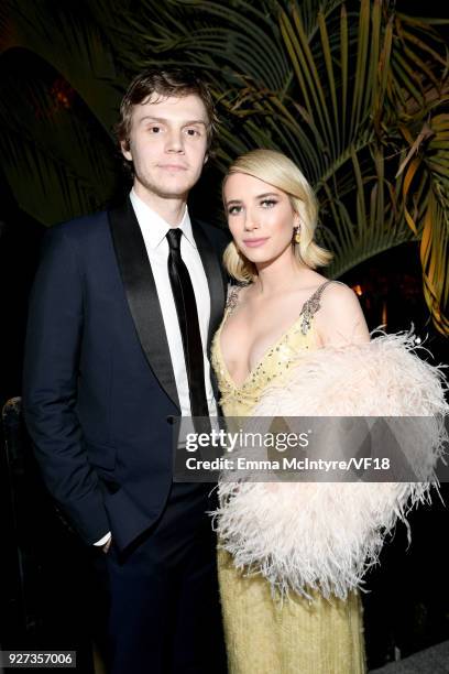 Evan Peters and Emma Roberts attend the 2018 Vanity Fair Oscar Party hosted by Radhika Jones at Wallis Annenberg Center for the Performing Arts on...