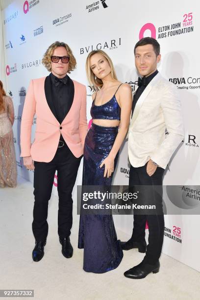 Peter Dundas, Natasha Poly, and Evangelo Bousis attend the 26th annual Elton John AIDS Foundation Academy Awards Viewing Party sponsored by Bulgari,...