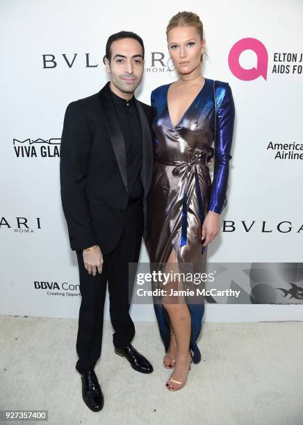 Mohammed Al Turki and Toni Garrn attend the 26th annual Elton John AIDS Foundation Academy Awards Viewing Party sponsored by Bulgari, celebrating...