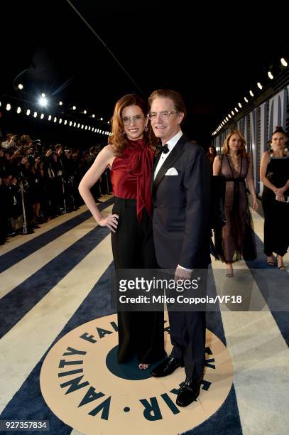 Desiree Gruber and Kyle MacLachlan attend the 2018 Vanity Fair Oscar Party hosted by Radhika Jones at Wallis Annenberg Center for the Performing Arts...