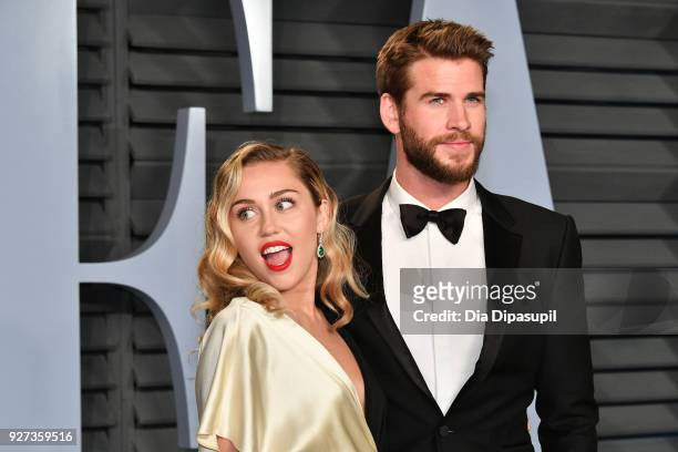 Miley Cyrus and Liam Hemsworth attend the 2018 Vanity Fair Oscar Party hosted by Radhika Jones at Wallis Annenberg Center for the Performing Arts on...