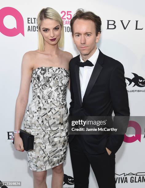 Allie Marie Evans and Tyler Shields attend the 26th annual Elton John AIDS Foundation Academy Awards Viewing Party sponsored by Bulgari, celebrating...