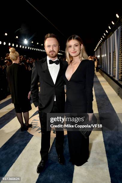 Aaron Paul and Lauren Parsekian attend the 2018 Vanity Fair Oscar Party hosted by Radhika Jones at Wallis Annenberg Center for the Performing Arts on...