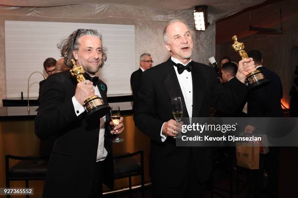 Visual effects artists Paul Lambert and John Nelson, winners of the Best Visual Effects award for 'Blade Runner 2049,' pose in the at the 90th Annual...