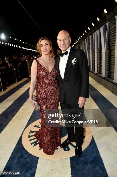 Sunny Ozell and Patrick Stewart attend the 2018 Vanity Fair Oscar Party hosted by Radhika Jones at Wallis Annenberg Center for the Performing Arts on...