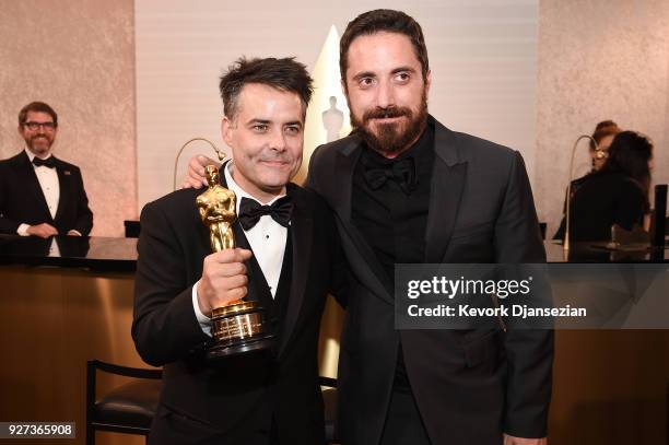 Academy Award winners Sebastian Lelio and Pablo Larrain pose with award for Best Foreign Language Film 'A Fantastic Woman' at the 90th Annual Academy...