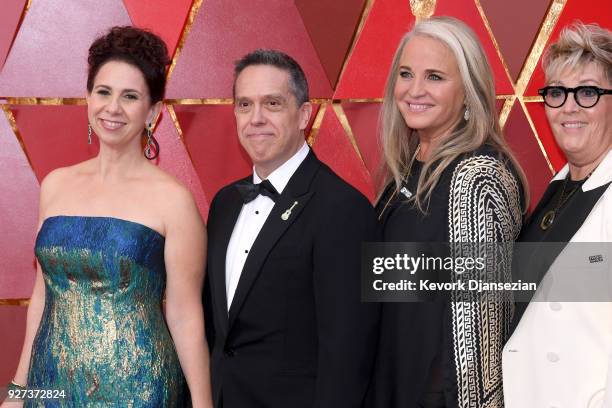 Filmmakers Lee Unkrich and Darla K. Anderson ith guests attend the 90th Annual Academy Awards at Hollywood & Highland Center on March 4, 2018 in...