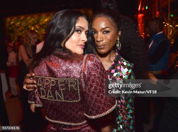 Salma Hayek Pinault and Angela Bassett attend the 2018 Vanity Fair Oscar Party hosted by Radhika Jones at Wallis Annenberg Center for the Performing...