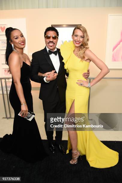 Lisa Parigi, Lionel Richie, and Petra Nemcova attend the 26th annual Elton John AIDS Foundation Academy Awards Viewing Party sponsored by Bulgari,...