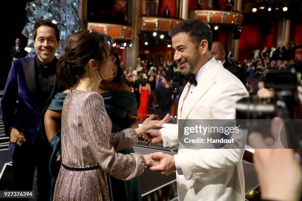 In this handout provided by A.M.P.A.S., Sally Hawkins and Jimmy Kimmel attend the 90th Annual Academy Awards at the Dolby Theatre on March 4, 2018 in...