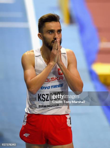 Adam Kszczot of Poland celebrates winning the Men's 800m Final during Day Three of the IAAF World Indoor Championships at Arena Birmingham on March...