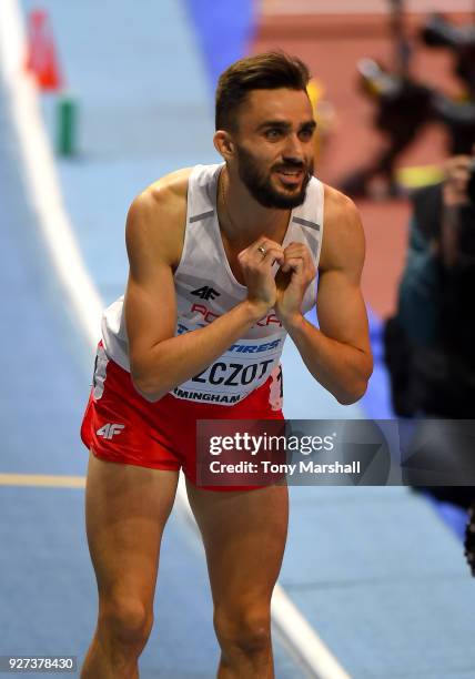 Adam Kszczot of Poland celebrates winning the Men's 800m Final during Day Three of the IAAF World Indoor Championships at Arena Birmingham on March...