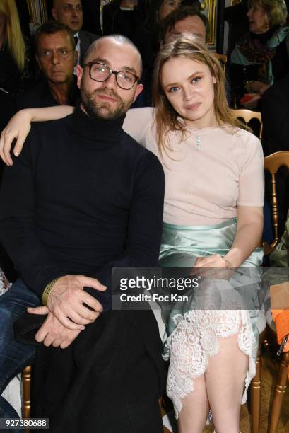 Actors Guillaume Gouix and Sara Forestier attend the John Galliano show as part of the Paris Fashion Week Womenswear Fall/Winter 2018/2019 on March...