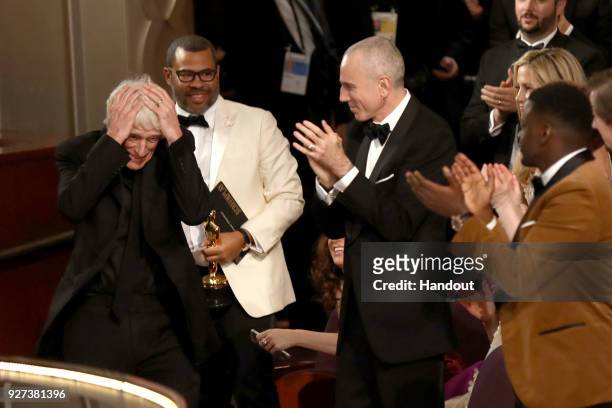 In this handout provided by A.M.P.A.S., Roger Deakins, Jordan Peele and Daniel Day-Lewis attend the 90th Annual Academy Awards at the Dolby Theatre...