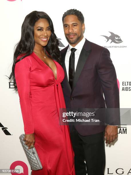 Kenya Moore and Marc Daly arrive to the 26th Annual Elton John AIDS Foundation's Academy Awards Viewing Party held at West Hollywood Park on March 4,...