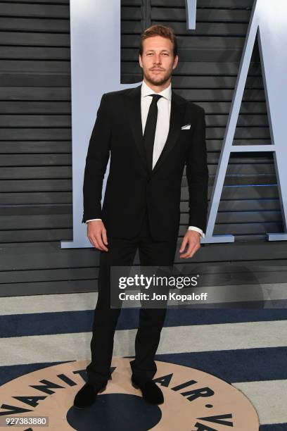 Luke Bracey attends the 2018 Vanity Fair Oscar Party hosted by Radhika Jones at Wallis Annenberg Center for the Performing Arts on March 4, 2018 in...