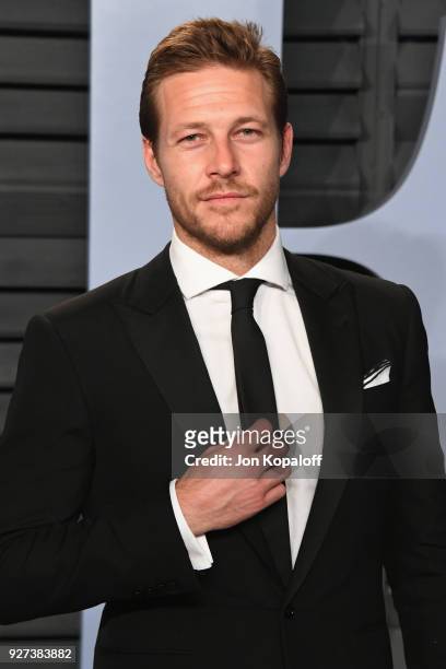 Luke Bracey attends the 2018 Vanity Fair Oscar Party hosted by Radhika Jones at Wallis Annenberg Center for the Performing Arts on March 4, 2018 in...