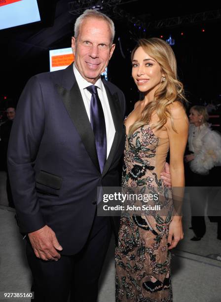 Steve Tisch , and Katia Francesconi attend the 26th annual Elton John AIDS Foundation Academy Awards Viewing Party at The City of West Hollywood Park...