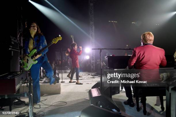 Sam Kiszka and Josh Kiszka of Greta Van Fleet perform onstage with Sir Elton John during the 26th annual Elton John AIDS Foundation Academy Awards...