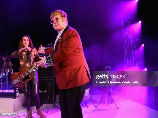 Jake Kiszka of Greta Van Fleet and Sir Elton John perform during the Elton John AIDS Foundation 26th Annual Academy Awards Viewing Party at The City...