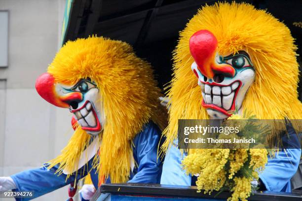 two waggis during the parade of the basler fasnacht - waggis stock pictures, royalty-free photos & images
