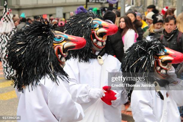 three waggis during the parade of the basler fasnacht - waggis stock pictures, royalty-free photos & images